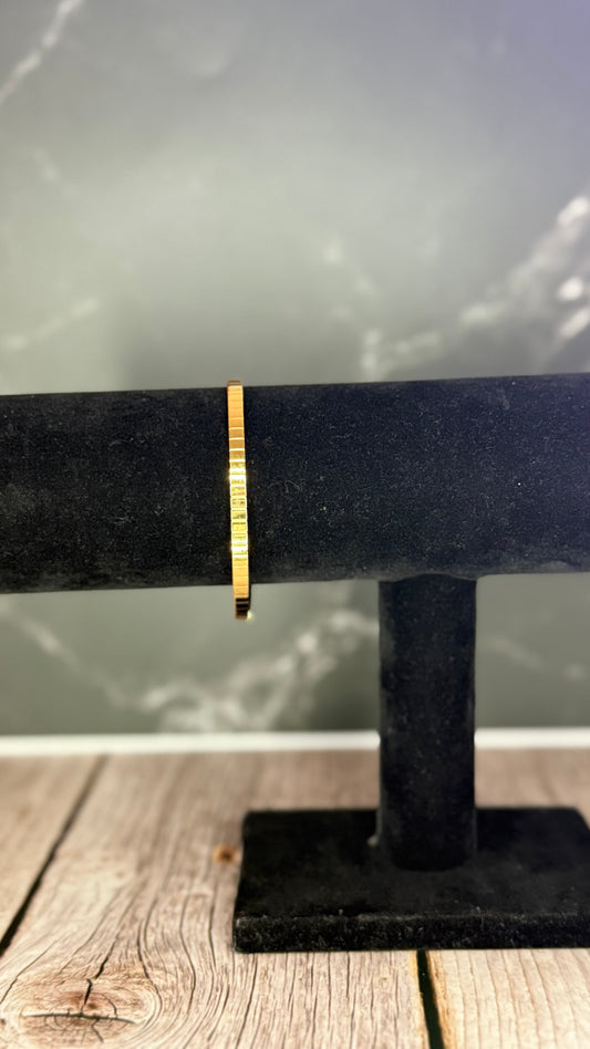 Gold cuff bracelet
